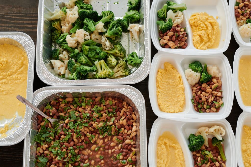 Photo by Julia M Cameron Healthy meal prep with broccoli, beans, and polenta in containers.